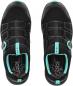 Preview: The shoes are black with a mesh pattern, equipped with wide adjustable straps and a practical twist closure. They are accented in light blue.