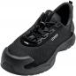 Preview: The shoe is a black, sporty sneaker with a breathable mesh upper. It has a cushioned sole and reinforced toe cap for added protection.