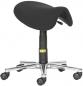 Preview: The chair has an oval, padded seat in black and an adjustable column. It stands on a five-spoke base with casters that provide mobility.