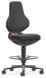 Preview: A modern office chair with black upholstery. The chair has a high backrest and a wide, comfortable seat. It stands on a rolling base with five casters.