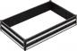 Preview: The image shows a rectangular, open container with black walls and white stripes on the short sides. The walls have a textured surface with upright, narrow indentations.