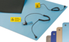 Preview: The image displays a blue ESD protection mat with a yellow warning sign. A cable with a grounding clip and a clamp is connected. Color variants of the mat are also visible.