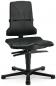 Preview: The chair is ergonomically designed, has black upholstery, and a high backrest. It stands on a rolling base with five sturdy wheels and height adjustability.