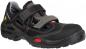 Preview: The shoe is black with gray and red accents. It has two adjustable Velcro straps and a sturdy, non-slip sole. Ideal for sports activities or work.