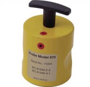 The image shows a round, yellow device with a black handle on top. It has two holes and a label that provides information about the model. It appears sturdy and handy.
