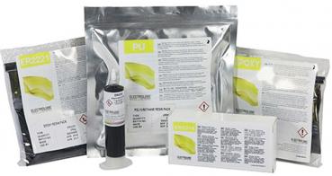 The image displays multiple products in silver packaging with yellow labels. There are various substances or materials, accompanied by a syringe and a white box containing instructions.