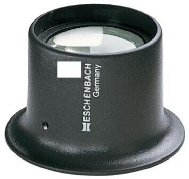 The image shows a black magnifying glass with a rounded base and a large, clear lens on top. On the side, it reads "ESCHENBACH Germany". Ideal for close-up viewing.