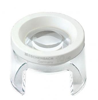 In the image, you see a magnifying glass with a white rim and a transparent base. The magnification is 10x. It is lightweight and easy to handle. Ideal for reading small texts.