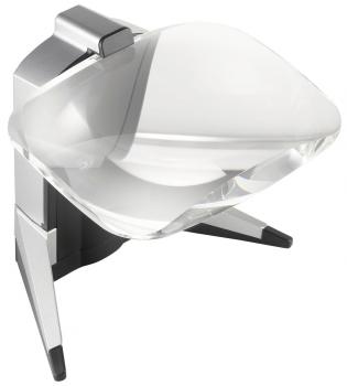 The image shows a modern magnifying glass with a transparent, curved glass. It is mounted on a sturdy, silver stand and has two black feet for stability.