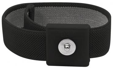 It is a black bracelet made of flexible, mesh-like material. It has a solid closure made of silver metal, which is round and centered.