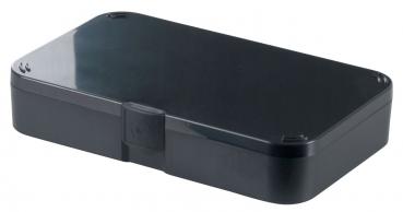 The image displays a rectangular, black plastic box. It has rounded corners, a simple, smooth lid, and a small buckle in the middle. Ideal for storing small items.