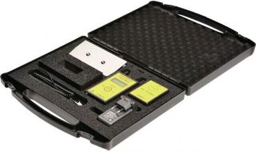 The image shows an electrostatic measuring device, consisting of a large, stable base unit with a display and a handheld sensor. Both are designed in yellow and black.