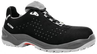 Der Schuh ist schwarz mit grauen Akzenten, hat zwei verstellbare Klettverschlüsse und eine perforierte Oberfläche für Belüftung. Die Sohle ist robust und rutschfest gestaltet.