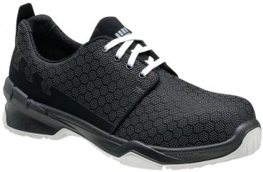 The shoe is black with a textured upper. It has white laces and a sporty, sturdy sole. The shape is modern and designed for comfort.