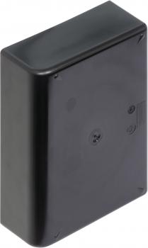 The picture shows a rectangular, black casing with rounded edges. It has a smooth surface and a flat back with a central indentation.