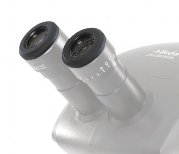 The image shows a microscope with two round eyepieces. The mounts are silver-colored and feature a scale. The design is compact and modern, ideal for scientific applications.