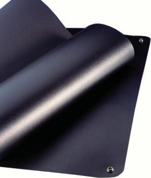 The image shows a matte, black surface that is partially flipped over. The corners are equipped with metal eyelets used for mounting. The surface appears velvety and supple.