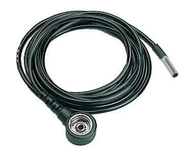 The image displays a black, flexible cable with a round, flat connector on one side and a thin, straight plug on the other side.