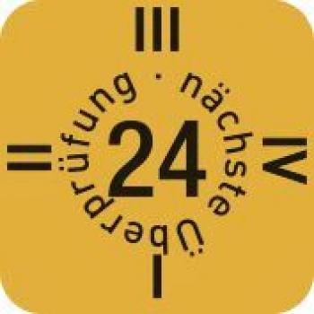 The image displays a yellow, square inspection mark. In the center is the number "24". Around the number, the words "next inspection" and "review" are arranged. There are lines at the corners.