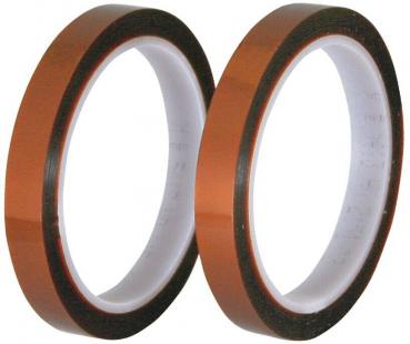 The image shows two rolls of tape. The tape has a brown exterior and a white interior. The rolls are placed side by side and are cylindrical. They are shiny and smooth.