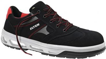 Der Schuh ist ein schwarzer Sicherheitsschuh mit roten Akzenten. Er hat eine stabile Sohle, graue Einsätze und geflochtene Schnürsenkel. Die Form ist sportlich und robust.