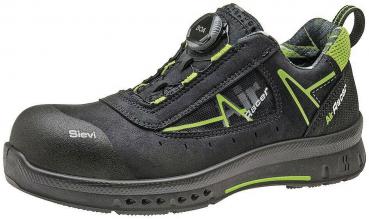The shoe is black with green accents. It has a firmer, non-slip sole and a protective toe cap. Upper made of breathable material with a quick lacing system.