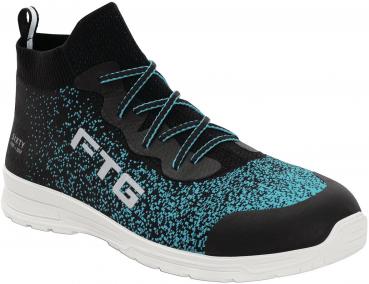The shoe has a tall, black upper with turquoise patterning. It is sportily cut, with an elastic shaft and a white sole. The side reads "FTG".