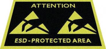 The image shows a sign on a black background with yellow triangles and the inscription 