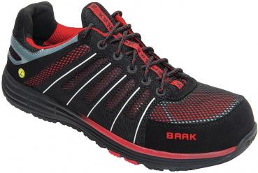 The shoe is a black, sturdy work shoe with red details. It has a padded tongue, a non-slip sole, and reflective stripes that make it safe.