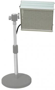 The image shows a table lamp with a rectangular metal lampshade. The lampshade stands on a sturdy round base, and the mast is adjustable.