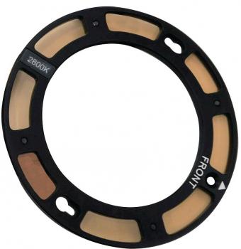 The image shows a round, black filter frame with several transparent areas. The frame is marked with "2800K" and "FRONT".
