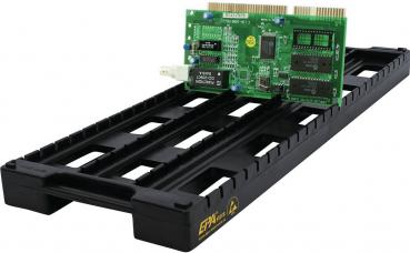 The image shows a black, elongated plastic frame with grooves, on which there is a green, rectangular circuit board with several electrical components and connections.