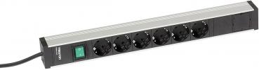 The image shows a black power strip with six slots, a switch, and a power cord. The top is made of metal, the bottom is plastic.