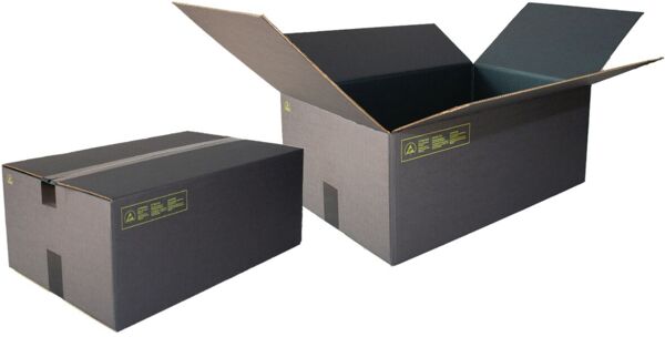 The image shows a rectangular, black cardboard box that is sealed on the top with two wide strips of tape. On one side, there is a yellow label with text.