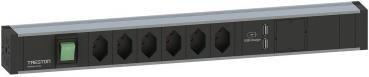 The image shows a black power strip with multiple sockets, a green indicator light, and USB ports. It has a long, flat shape.