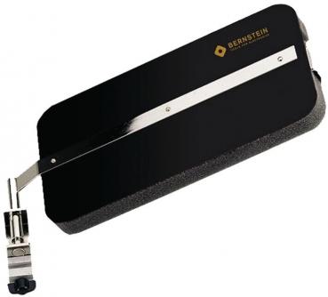 The image shows a black, rectangular toolbox with a shiny metal handle. There is a small lever on the side, which might be used for operation.
