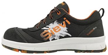 The shoe is black with orange accents and a striking logo. It has a light sole and is sportily designed, suitable for outdoor sports or work.