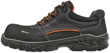 The shoe is black with orange accents. It has a round, reinforced toe cap, a non-slip sole, and laces. The surface features some texture details and ventilation elements.