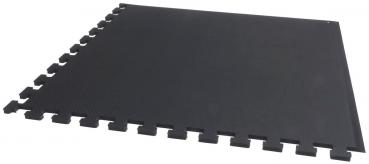 The image displays a black, square mat with serrated edges that can be interlocked. It is made from a flexible, non-slip surface.