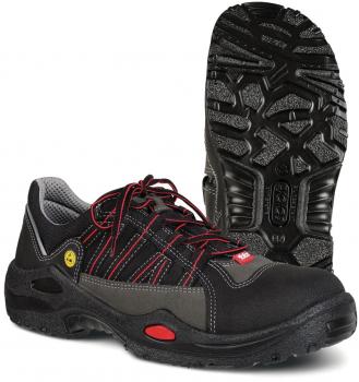 The image shows a black shoe with gray and red accents. It has laces and a non-slip rubber sole with good tread. The shoe is sporty, sturdy, and comfortable.