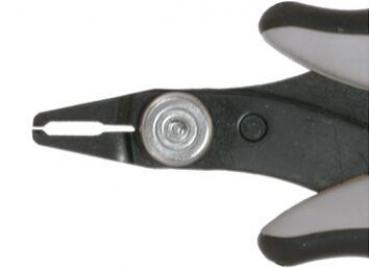 The image shows a pair of pliers with black and gray handles. At the tip, the cutting edges are visible, which are used for gripping and cutting wires or similar materials.