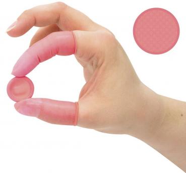 The image shows a hand holding a small, round, pink object. The finger is also covered with a pink, protective layer. To the right, a similar round object is depicted.