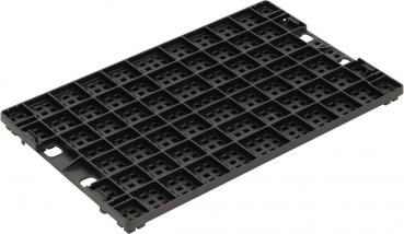 The image shows a rectangular, black plastic palette with many small square openings. The surface is flat and the edges are slightly rounded.