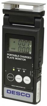 The image displays a portable device for measuring electric charge. It features a digital display with buttons and a top plate for measurement. The color scheme is primarily black.