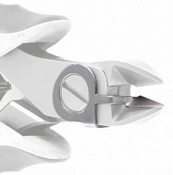 The image shows a metallic pliers used for cutting or bending. It has a sharp edge and a round cutout in the middle to provide better grip.