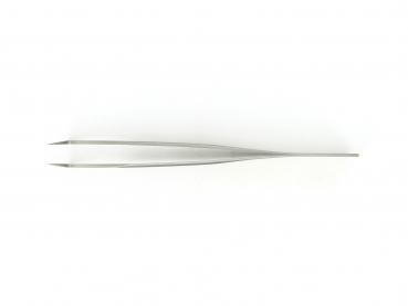 The image shows a straight, narrow metal tweezer. It has two long, pointed ends and is slightly wider in the middle. The background is uniformly light.