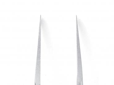 The image shows a straight, sharply pointed metal tweezer. It has long, narrow gripping surfaces and is slightly shiny, placed on a light background.