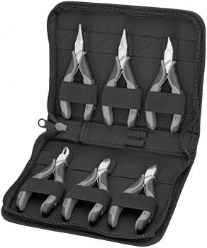 The image shows a black tool bag that is open. Inside, there are several pliers with gray handles, neatly secured in pockets. The pliers vary in length and shape.