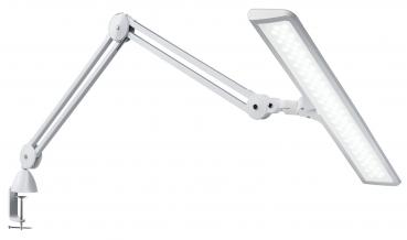 The image shows a white desk lamp with a flexible arm. The lampshade is rectangular and flat. The lamp is attached to the table with a clamp.