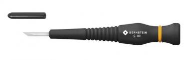 The image shows a black screwdriver with a round handle and a narrow, flat blade. Next to it is a small, black cap attachment. The handle has a yellow stripe.